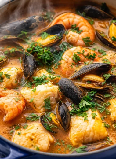 Traditional French Bouillabaisse, a seafood stew with saffron and fresh fish.