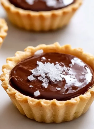Decadent French chocolate tartlets with a rich chocolate filling and crust