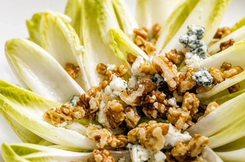 Quick French Endive Salad Recipe with Walnuts and blue cheese served in a bowl.