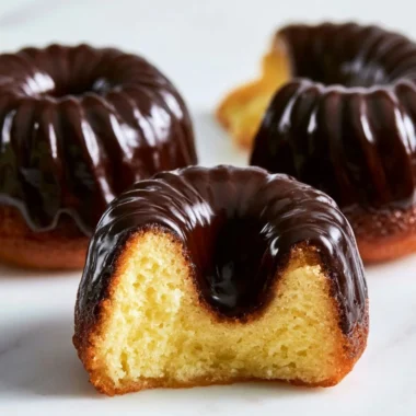 Traditional Canelé French caramelized custard cakes with a crispy shell and soft center