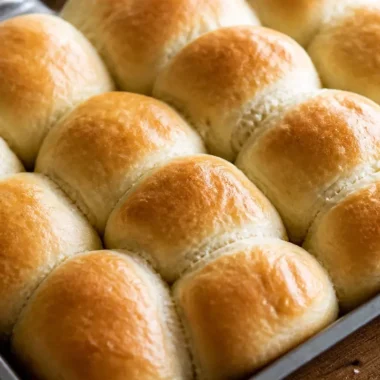Easy 30-minute dinner rolls fresh out of the oven, golden brown and fluffy.
