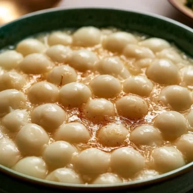 A box of Anis de Flavigny, traditional French candy with a unique flavor.
